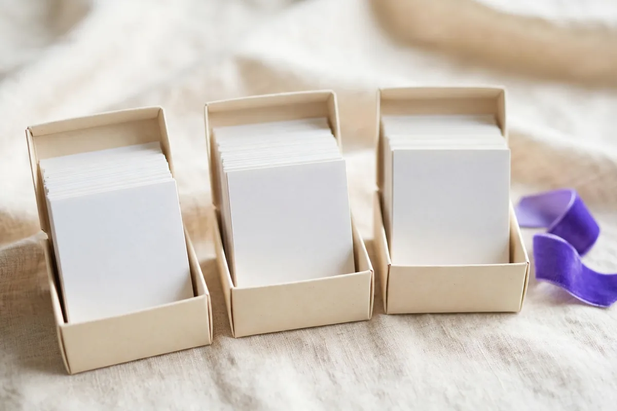 Index cards sorted into boxes